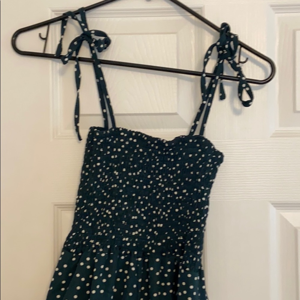 Emerald green with white polkadot jumpsuit